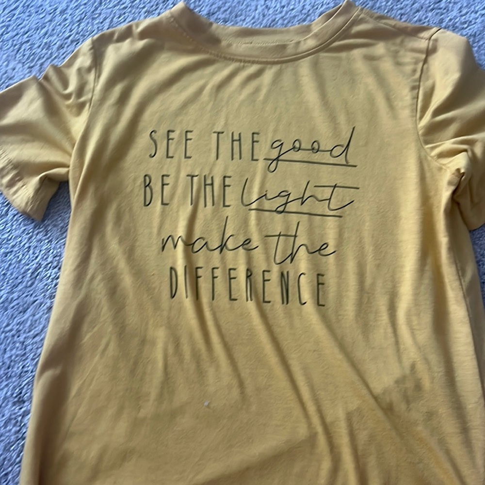 This shirt is an adult small from SHEIN in a yellow color.